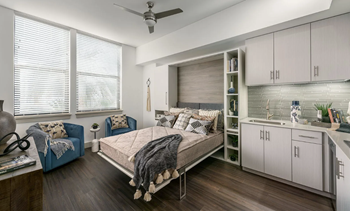 Murphy beds w/ gloss finish, fabric headboards & natural wood accents*